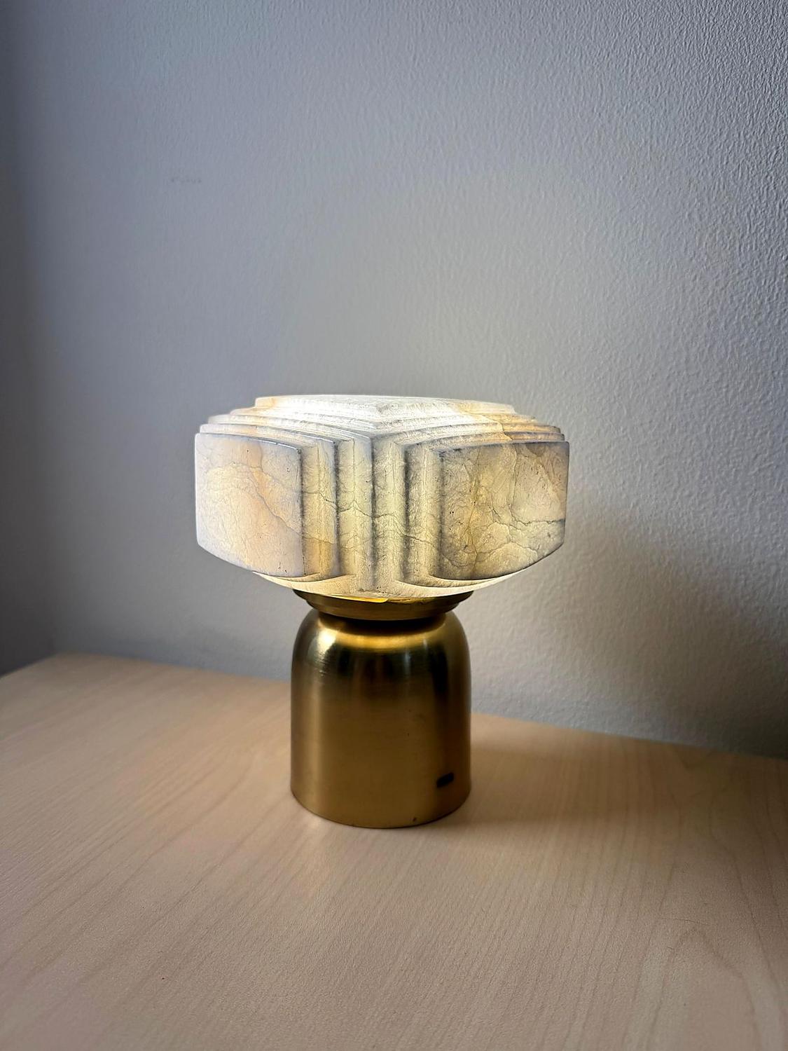 Frosted cube on brass base
