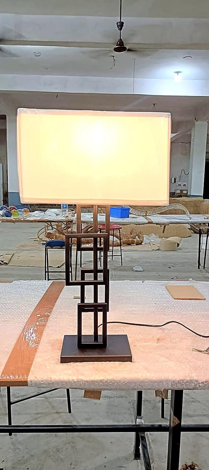 Table lamp · lit signature