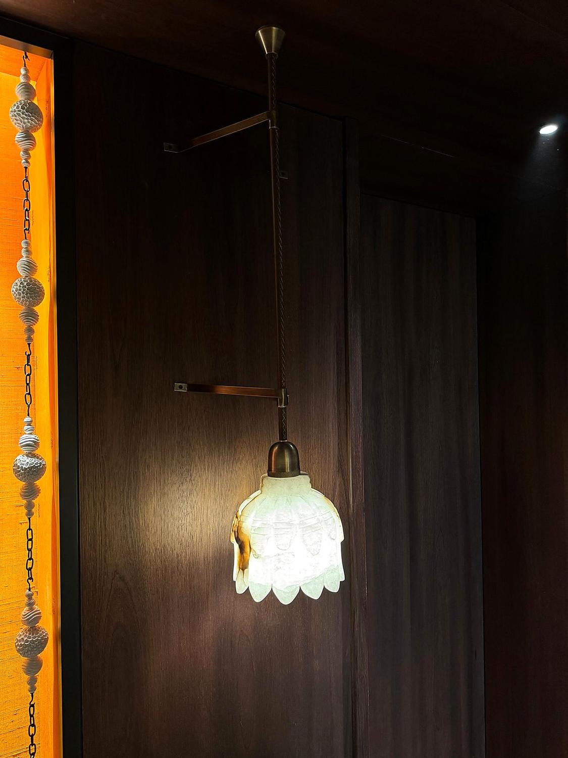 Signature pendant · corridor